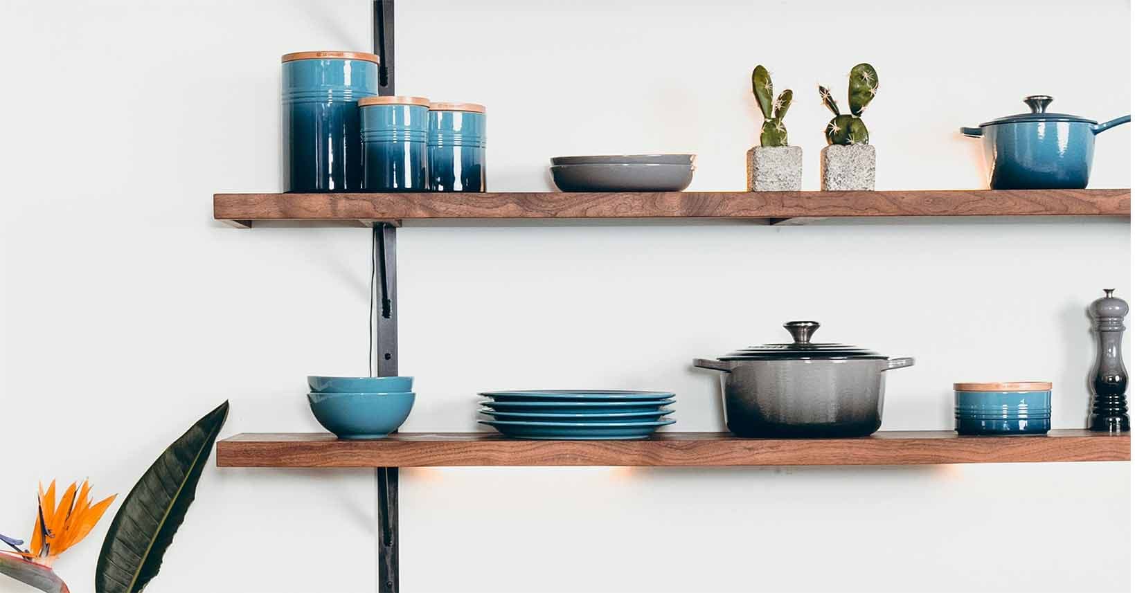 Merchandised kitchen shelves with space between things